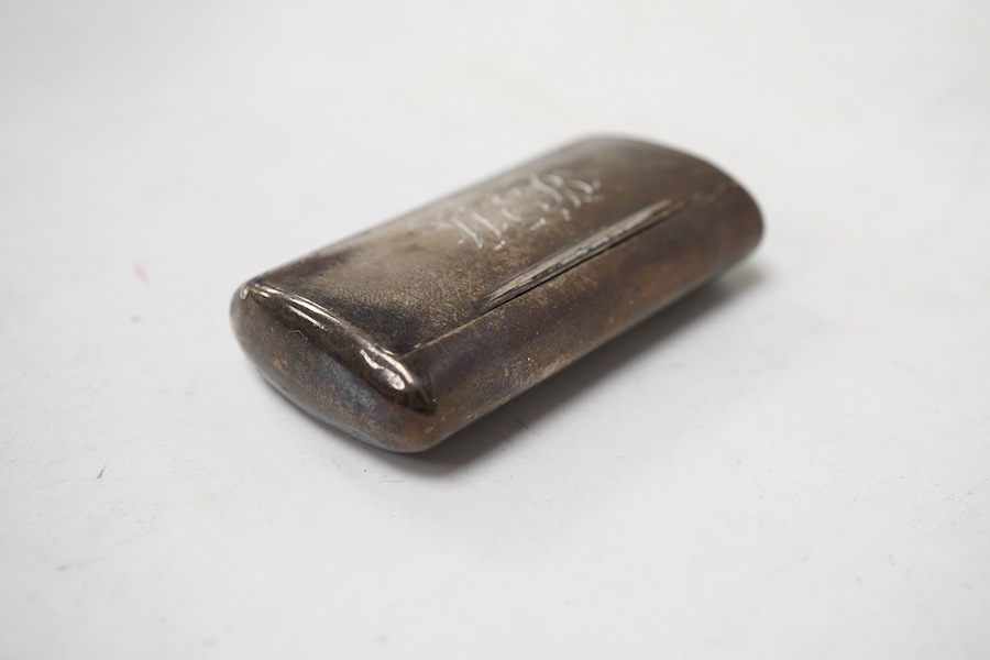 A George III silver ovoid snuff box, with engraved monogram, Samuel Pemberton, Birmingham, 1804, 59mm.